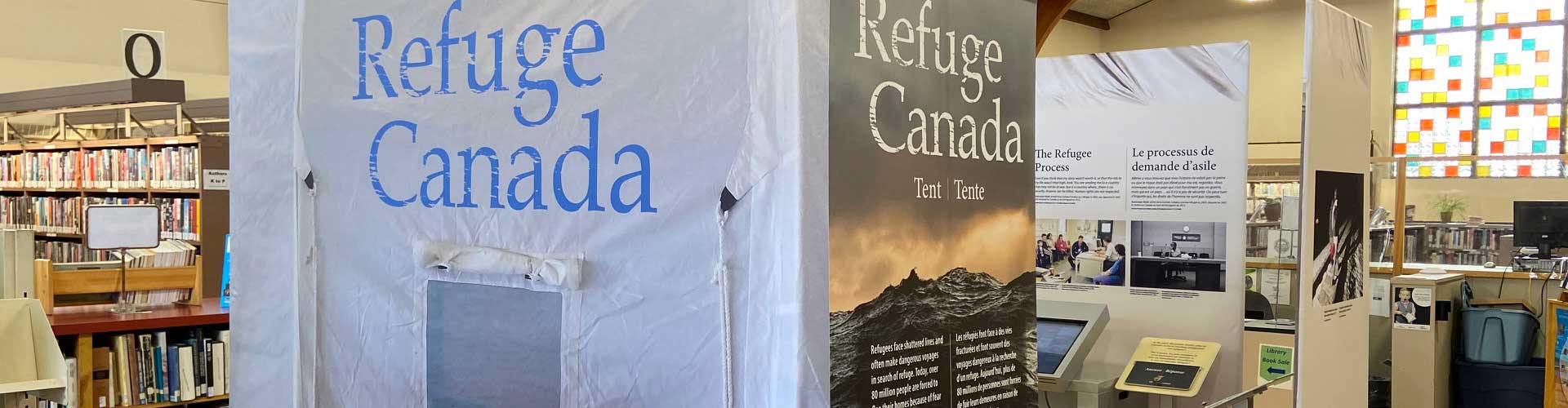 Refuge Canada is printed on the grey fabric of a full-size tent panel.