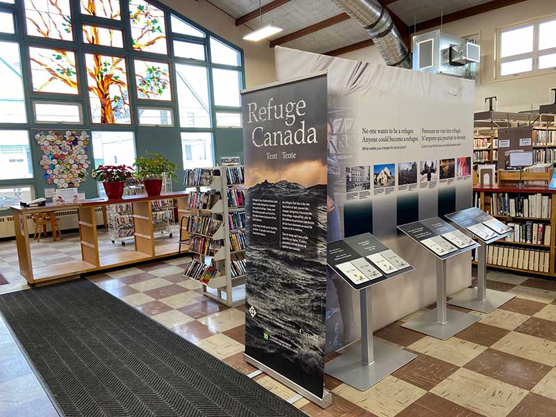 The Refuge Canada Tent panels and kiosks are configured to fit in a small floor plan.