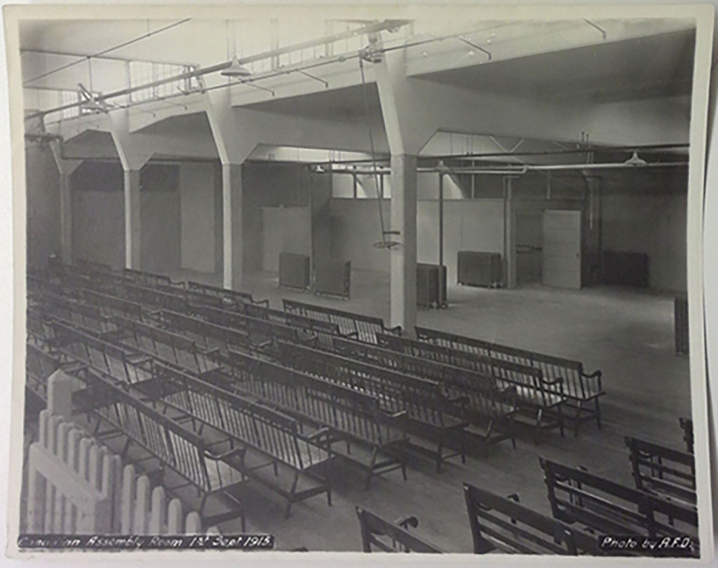 A huge hall with rows and rows of benches.