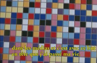 Colourful floor made up of very small tiles.