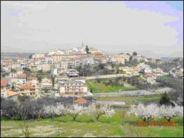 Artist rendering of small European hillside town.