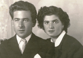 Head and shoulders portrait of man and woman.