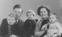 Family portrait showing young Maria with husband and three children.