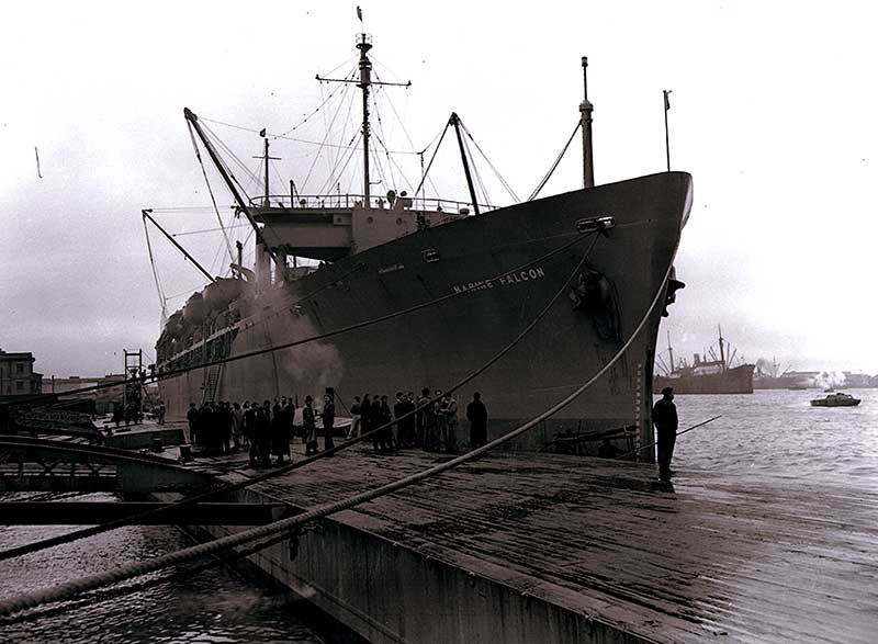 A ship is docked in the harbour.
