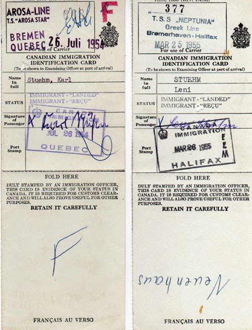 Old Canadian Immigration Identification Card with stamps and a name, signature, and status.