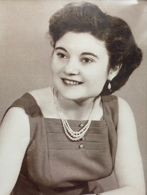 A black and white portrait of an Italian woman.