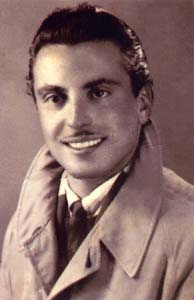 Sepia-toned portrait of Vittorio, with moustache and slicked-back hair.